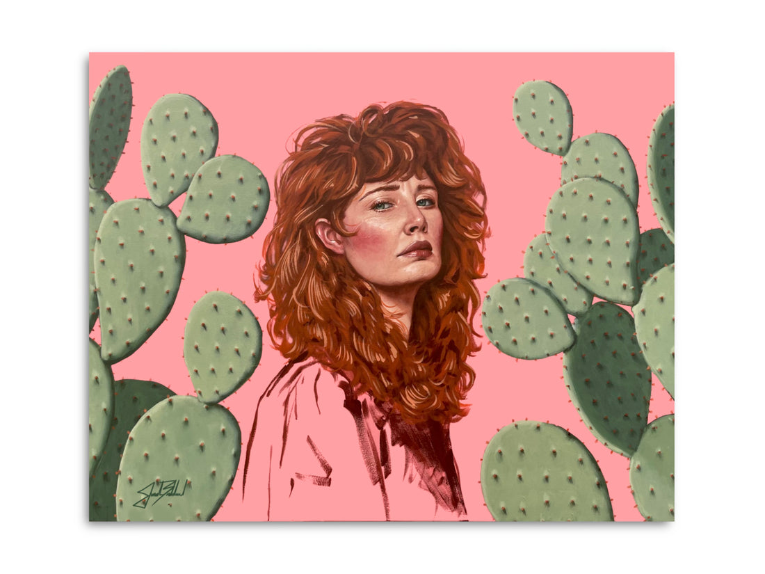 A paper print artwork featuring a portrait of a woman with red hair and cacti in the background, painted with acrylic on a pink background.