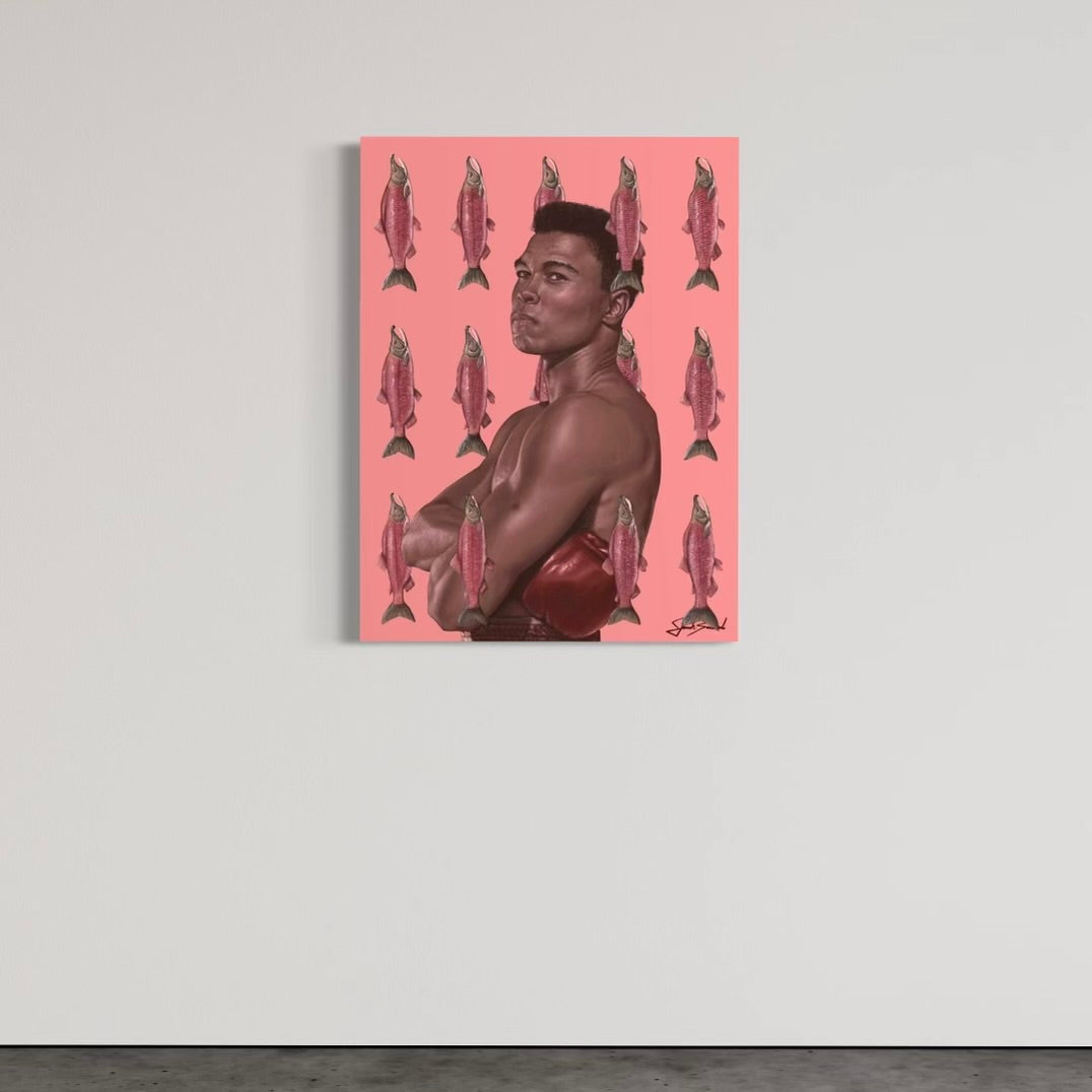 Canvas print featuring a portrait of Muhammad Ali with a pink background and decorative fish patterns.