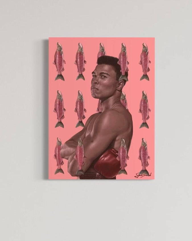 Canvas print featuring a portrait of Muhammad Ali with a pink background and decorative fish patterns.