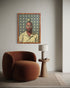 Modern interior with a brown chair, side table, and framed artwork on the wall.